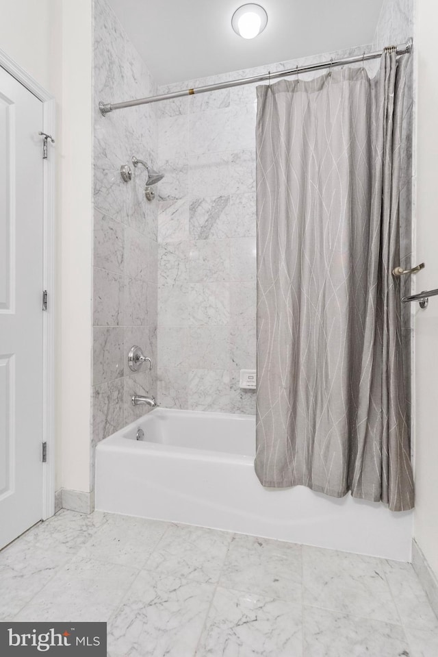 full bath featuring shower / tub combo with curtain