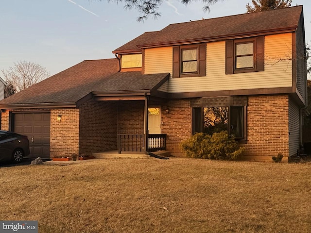 view of front of home featuring a porch, an attached garage, brick siding, roof with shingles, and a front yard