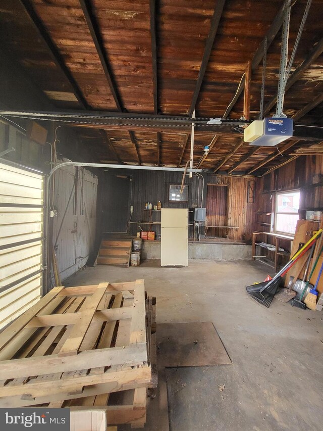 garage featuring a garage door opener