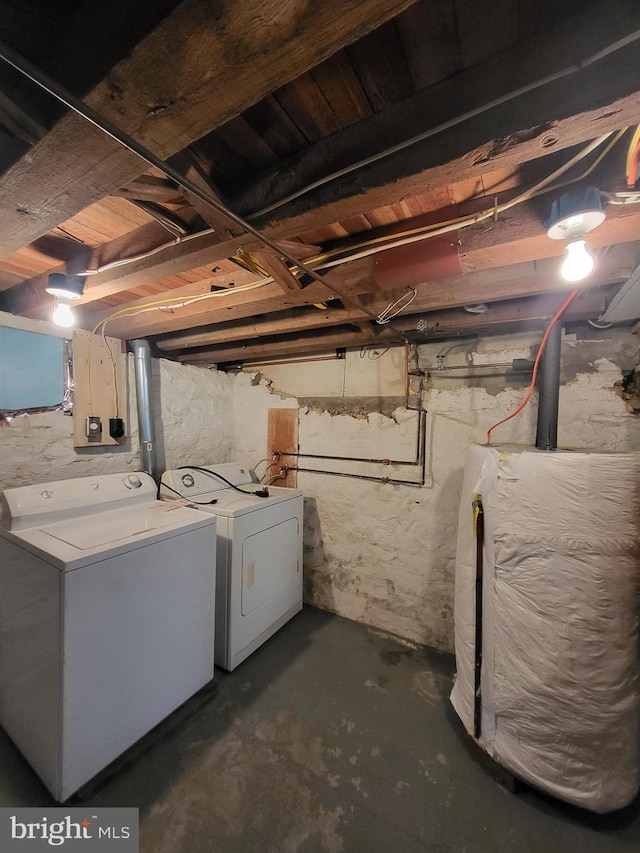 unfinished basement featuring washer and dryer