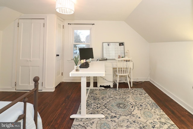 home office featuring dark wood-style floors, baseboards, and vaulted ceiling