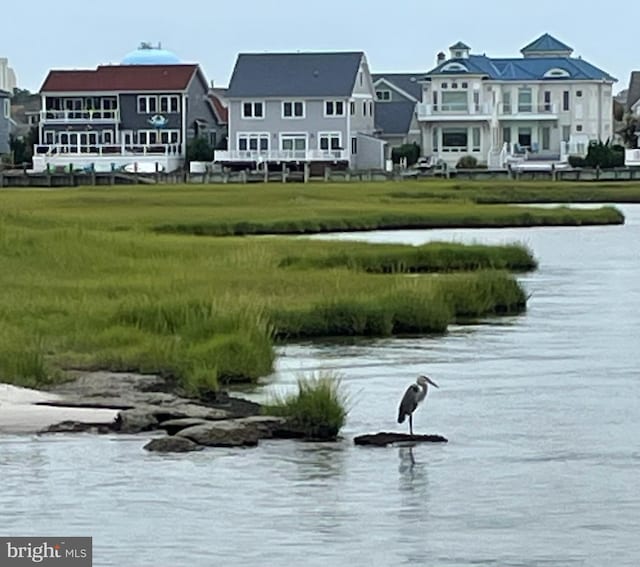 property view of water featuring a residential view