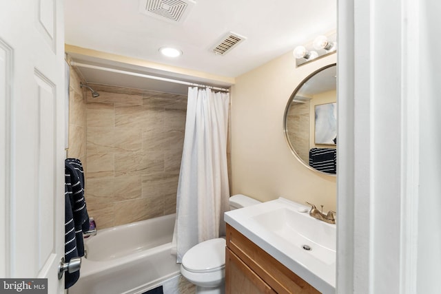 full bathroom featuring toilet, shower / bath combination with curtain, vanity, and visible vents