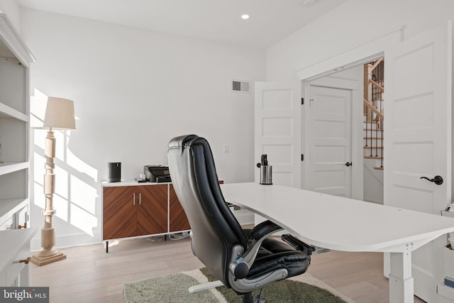 home office with recessed lighting, visible vents, and light wood finished floors