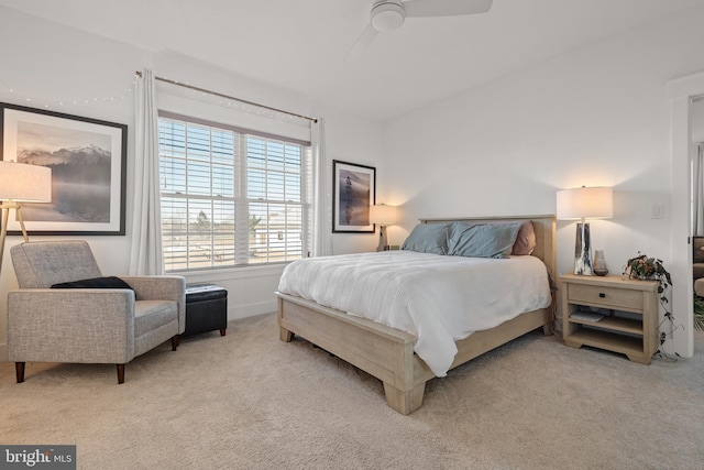 carpeted bedroom with a ceiling fan