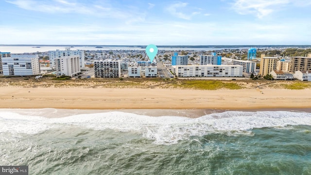 aerial view with a view of city, a water view, and a view of the beach