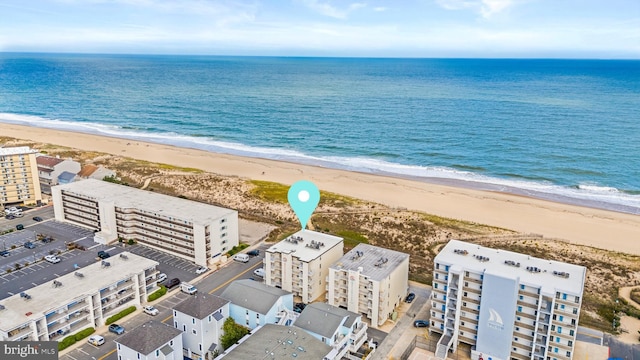 aerial view with a view of the beach and a water view