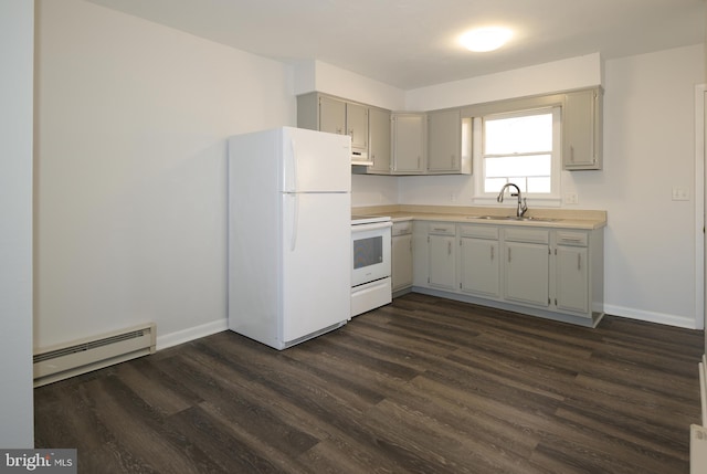 kitchen featuring a baseboard radiator, white appliances, dark wood-style flooring, a sink, and light countertops