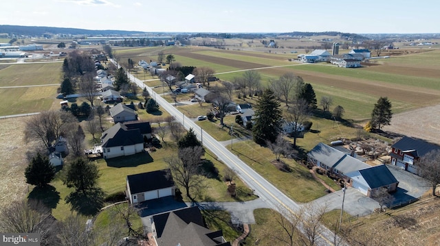 birds eye view of property featuring a rural view