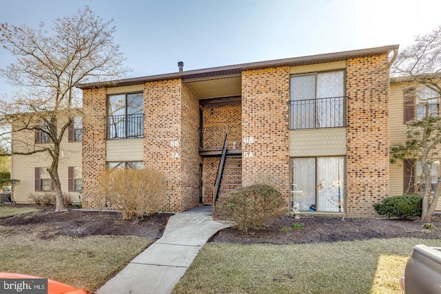 view of front of home with brick siding