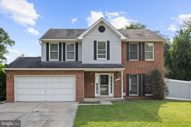 view of front of home featuring a front yard, concrete driveway, brick siding, and fence