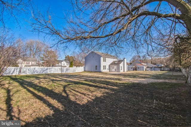 view of yard with fence