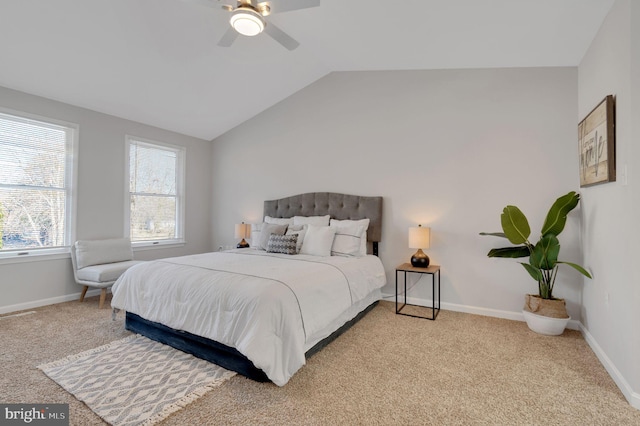 bedroom featuring lofted ceiling, carpet, baseboards, and a ceiling fan