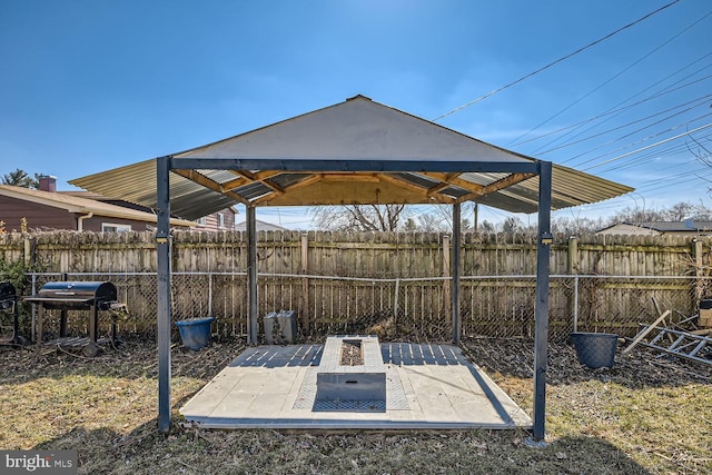 view of patio / terrace with a gazebo, fence, and area for grilling