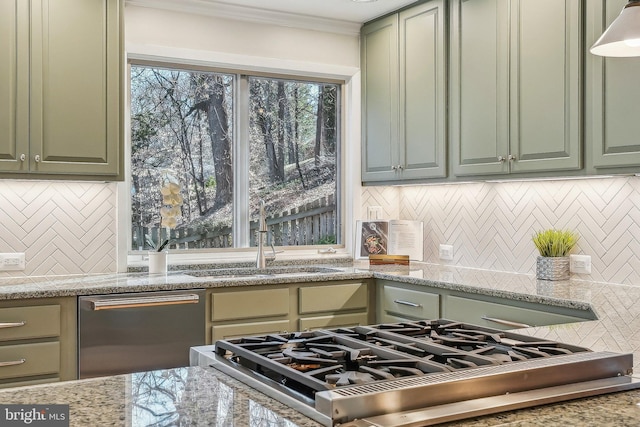 kitchen featuring a sink, stainless steel dishwasher, and green cabinets