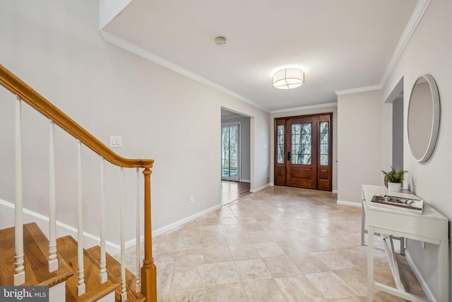 entryway with stairway, baseboards, and crown molding