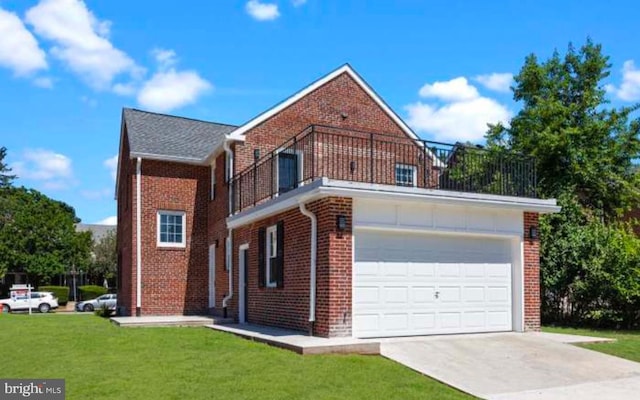 view of side of property with brick siding, a yard, concrete driveway, a balcony, and a garage