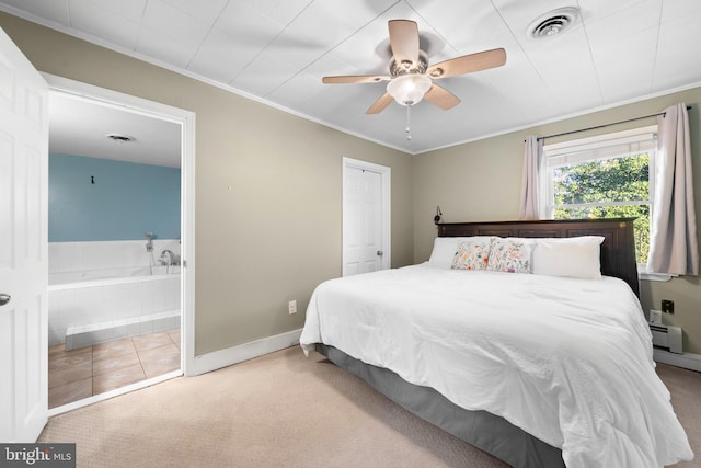 carpeted bedroom with visible vents, baseboards, ornamental molding, ensuite bathroom, and tile patterned floors