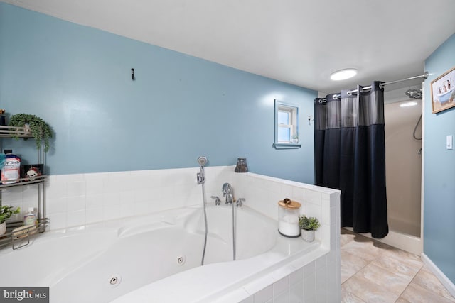 full bathroom featuring a stall shower and a whirlpool tub