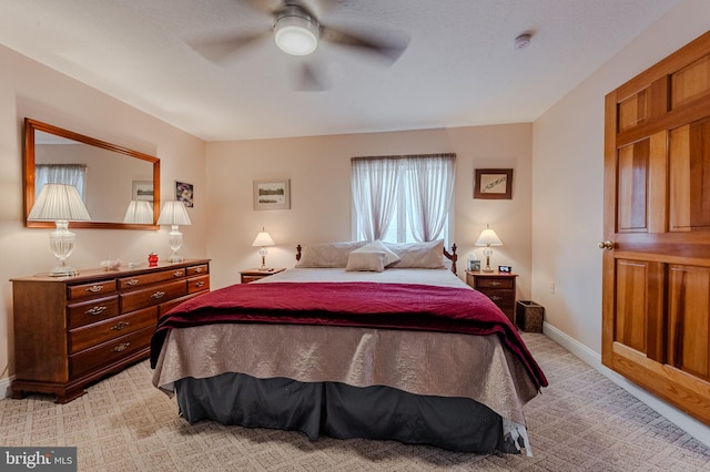 701 Paris Kirby Rd, Milford, DE 19963 - bedroom featuring light carpet, baseboards, and ceiling fan