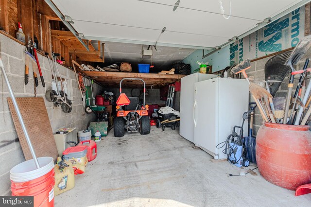 701 Paris Kirby Rd, Milford, DE 19963 - garage with freestanding refrigerator