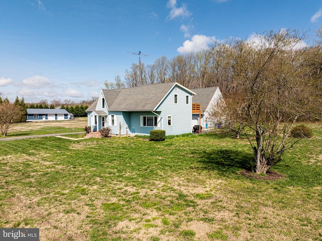 701 Paris Kirby Rd, Milford, DE 19963 - view of side of property featuring a yard and roof with shingles