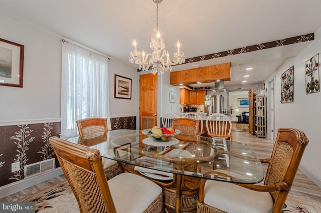701 Paris Kirby Rd, Milford, DE 19963 - dining room featuring light wood-style floors, a chandelier, wainscoting, and recessed lighting