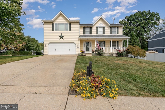 view of front of property featuring a porch, an attached garage, fence, concrete driveway, and a front yard