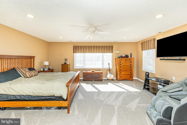 carpeted bedroom with ceiling fan, baseboards, and recessed lighting