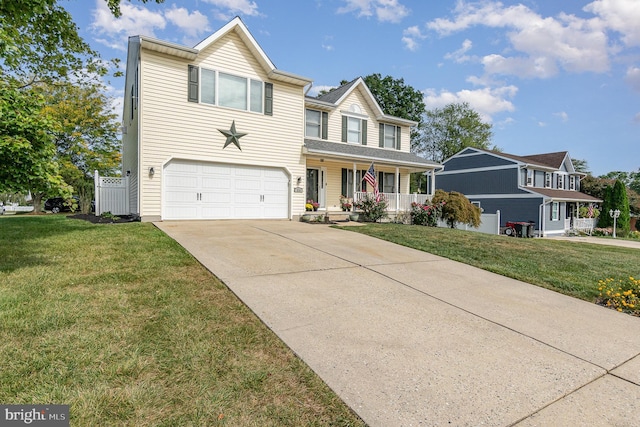 traditional-style home featuring a porch, a garage, driveway, and a front lawn