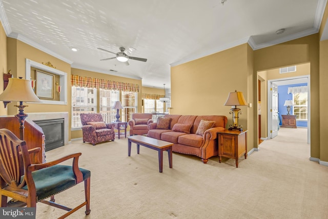 living room with visible vents, crown molding, baseboards, a fireplace with flush hearth, and carpet flooring