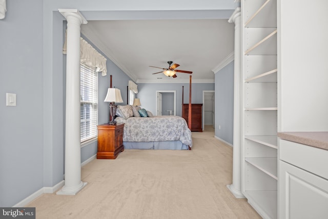 bedroom featuring crown molding, decorative columns, baseboards, and light carpet