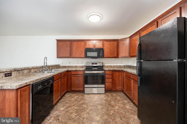 kitchen with brown cabinets, black appliances, and a sink