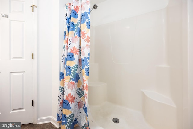 full bathroom with a shower with curtain