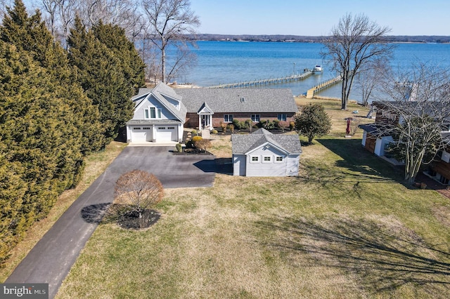 bird's eye view with a water view