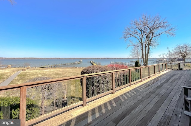 deck featuring a water view