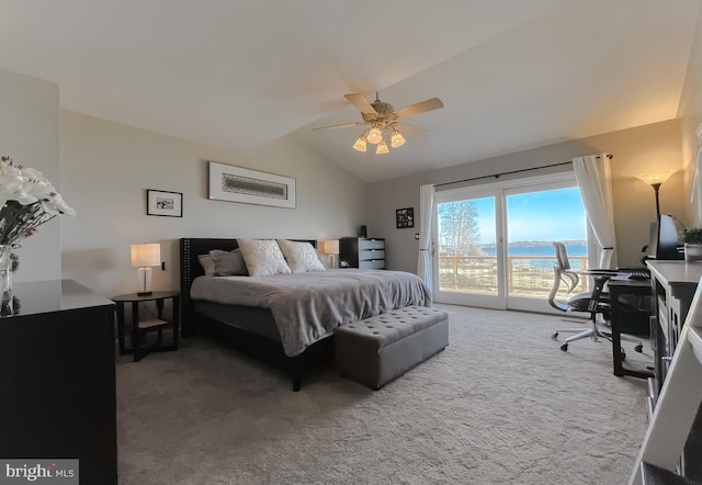 bedroom featuring access to exterior, carpet flooring, vaulted ceiling, and ceiling fan