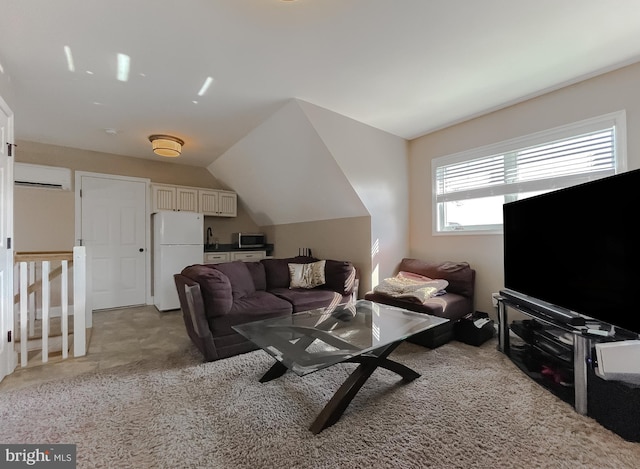 living area featuring vaulted ceiling and a wall mounted air conditioner