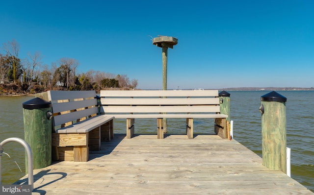 dock area featuring a water view