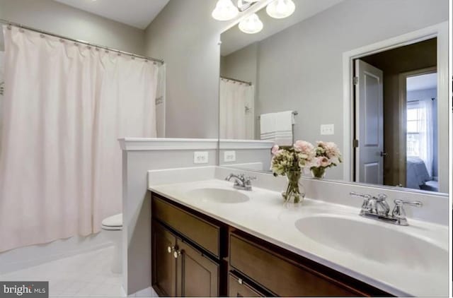 42578 Dreamweaver Dr, Brambleton, VA 20148 - bathroom with a sink, toilet, and double vanity