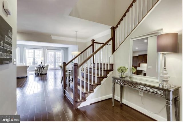 42578 Dreamweaver Dr, Brambleton, VA 20148 - staircase featuring baseboards and wood finished floors