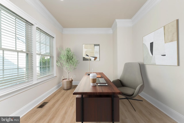 office featuring baseboards, light wood-style floors, visible vents, and ornamental molding