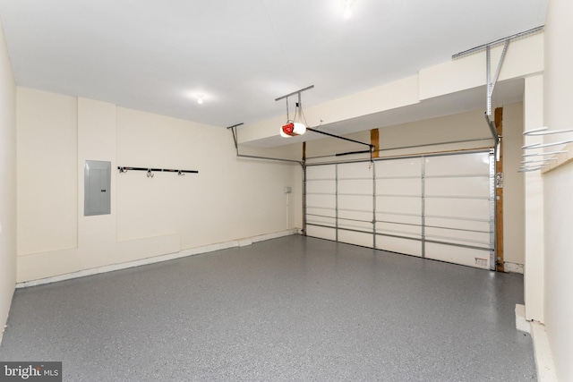 garage featuring electric panel and a garage door opener