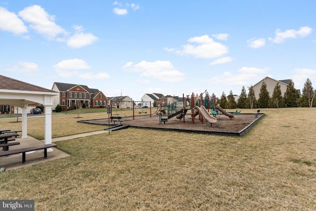 community play area with a lawn