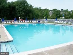 community pool with fence