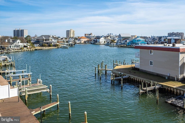 view of dock with a water view and boat lift