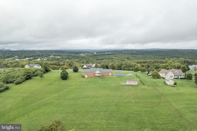 bird's eye view featuring a view of trees