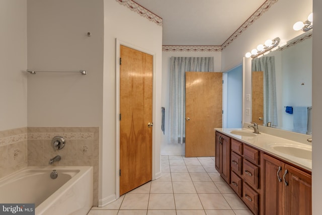 full bath featuring double vanity, a garden tub, a sink, and tile patterned floors