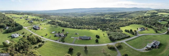 birds eye view of property featuring a rural view and a mountain view