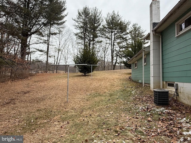 view of yard featuring central AC